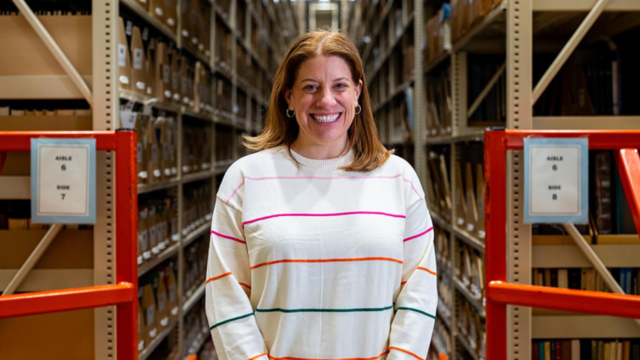 Nicole Craven posing in the Ohio State University Archives.